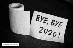 Conceptual image of toilet paper, symbol of covid-19 crisis and pandemia in 2020. Abstract image, saying goodbye to the bad year, leaving the past behind, hoping for better.